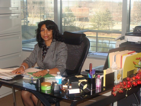 Erica Muhammad sitting at a desk